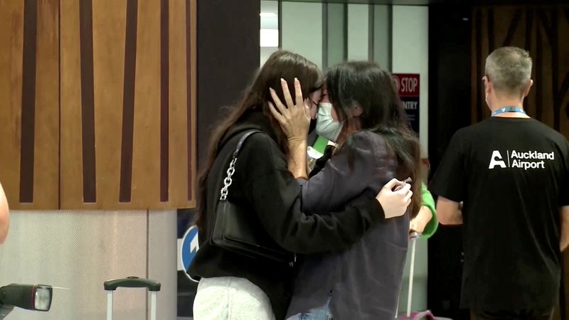 Tears and chocolate as New Zealand opens its borders to 60 more countries