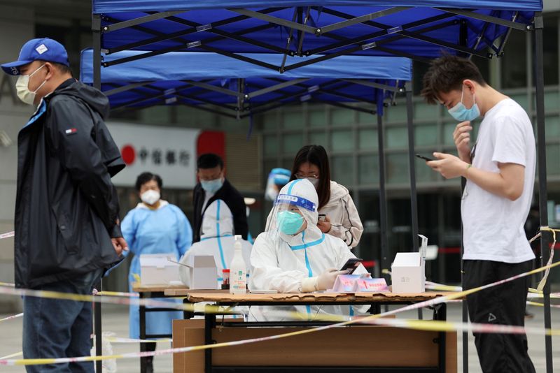 Tesla stutters under Shanghai lockdown; Beijing keeps hunting COVID