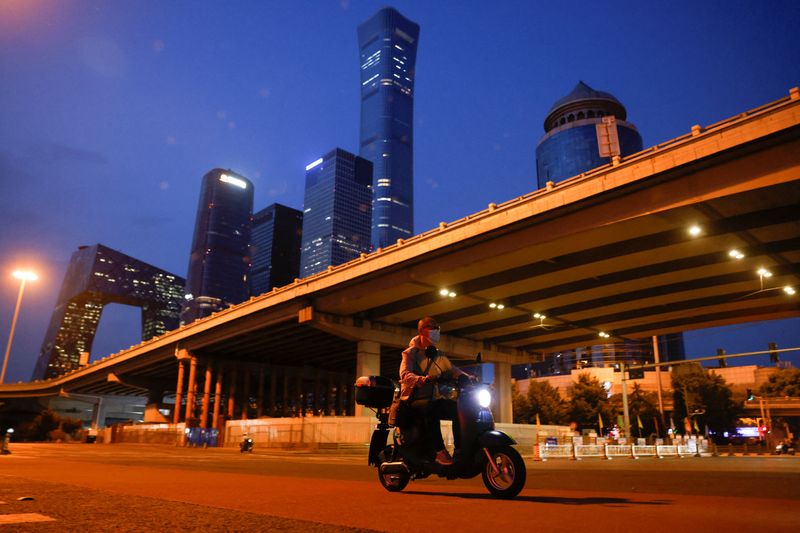 Tightening COVID net, Beijing deals out punishments, stark warnings