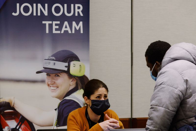 US April payrolls rise more than expected, wages rise less than March