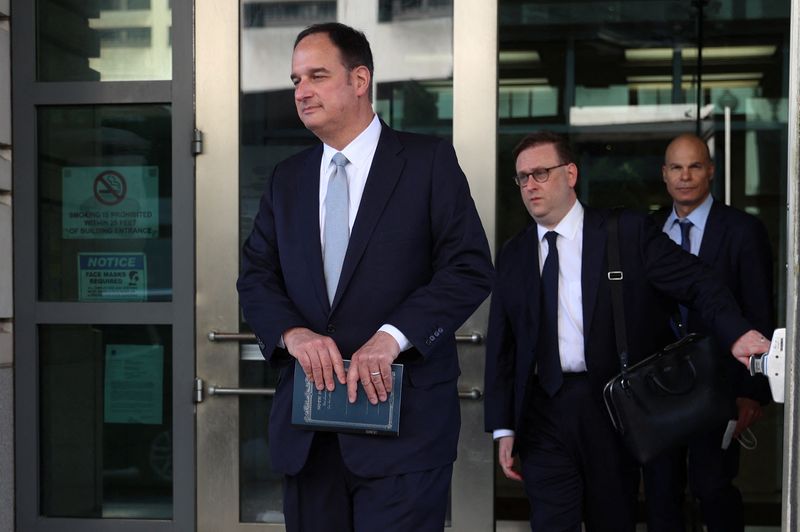 U.S. jury finds ex-Clinton campaign lawyer not guilty of lying to FBI