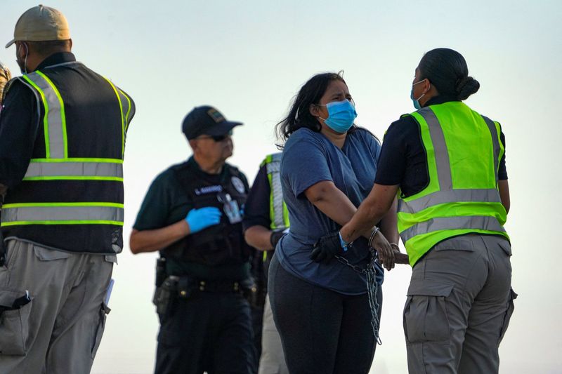 Under political pressure, Biden officials toughen border message