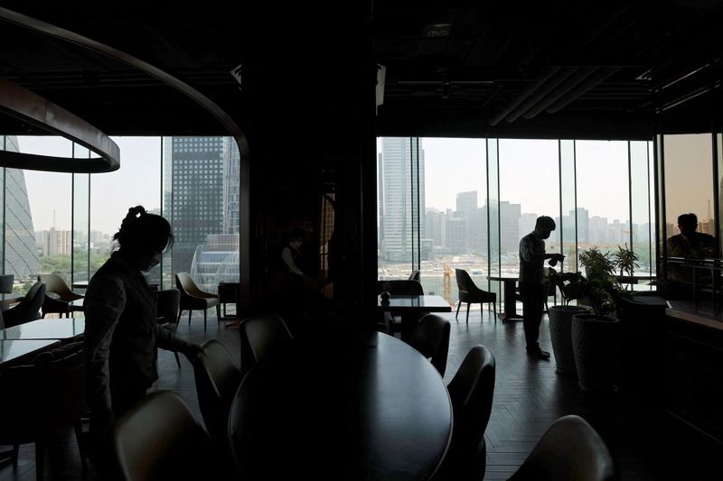 China May services activity contracts for third straight month - Caixin