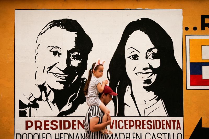Colombians choosing between leftist, business magnate in tight vote