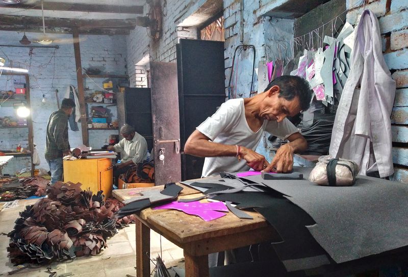 Firms in India's ancient shoe capital squeezed by costs, fading demand