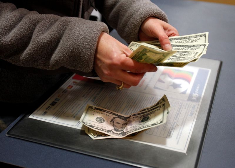 U.S. firms show first hints of impact of Fed's policy tightening, survey shows
